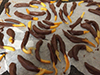 Chocolate-coated candied orange peel setting